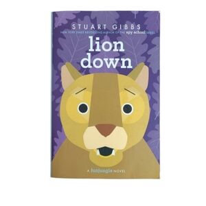 Lion Down by Stuart Gibbs - Like New Condition - Paperback